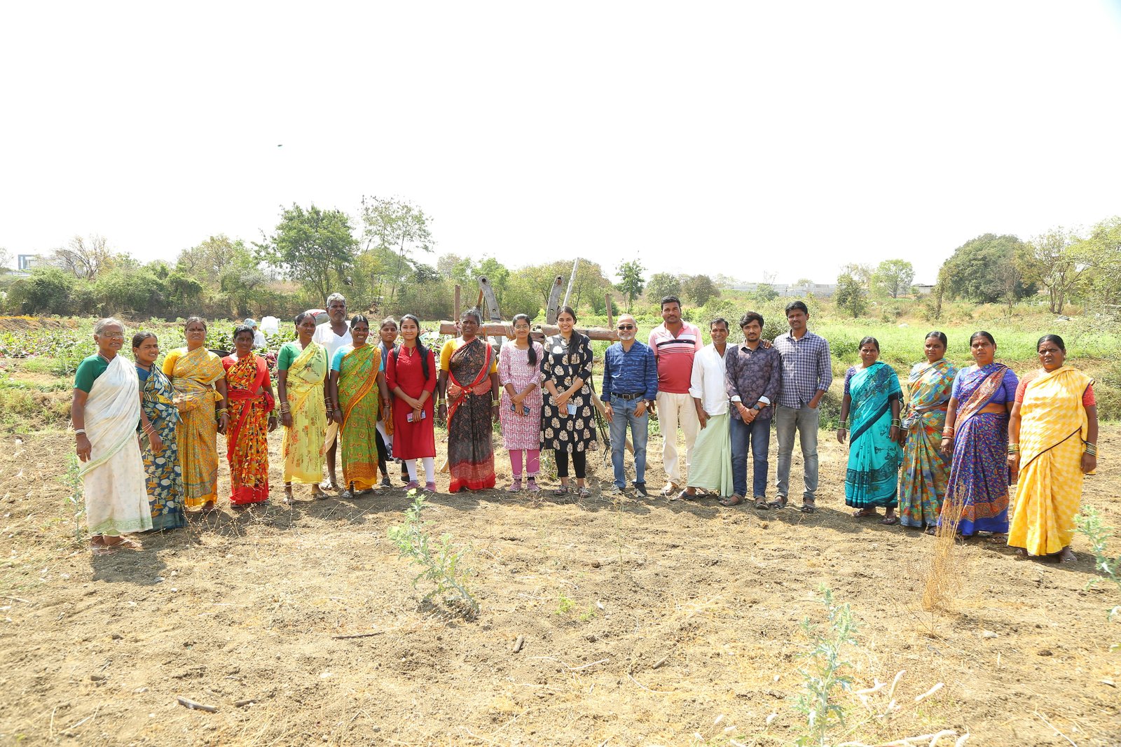 Corporate volunteers on a field visit with the community